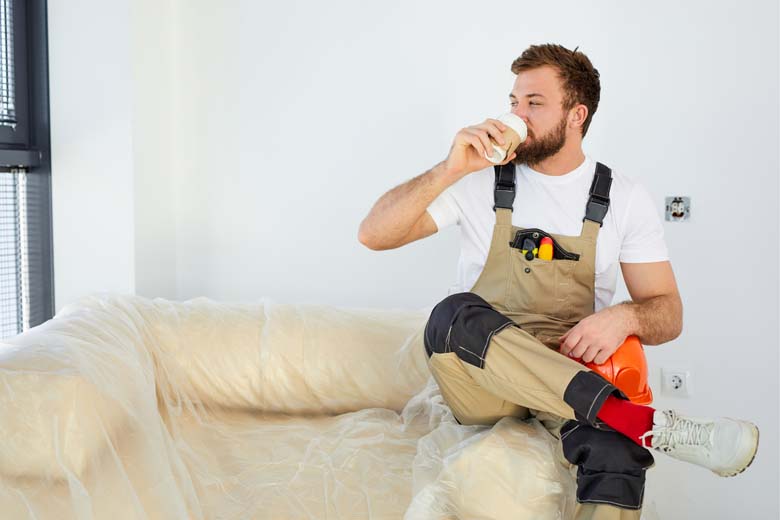 Tradesperson drinking tea