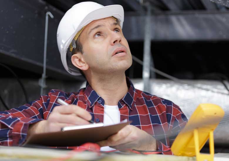 tradesperson-looking-up
