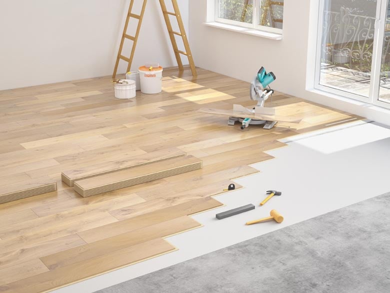 laminate flooring being laid in the direction of the window