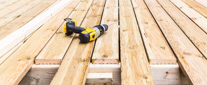 decking being screwed down in installation